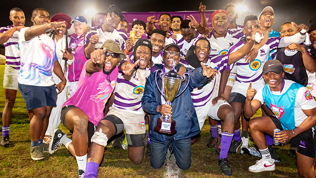 Rhodes 老虎机游戏_pt老虎机-平台*官网 Vice-Chancellor, Professor Sizwe Mabizela, celebrates with the rugby team after the final whistle. Photo cred: Vusumzi Tshekema.